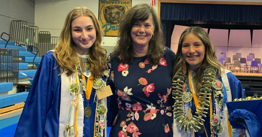 Kate Williams, principal of Cordova Jr/Sr High School with the valedictorian, right, and salutatorian from the Class of 2021.