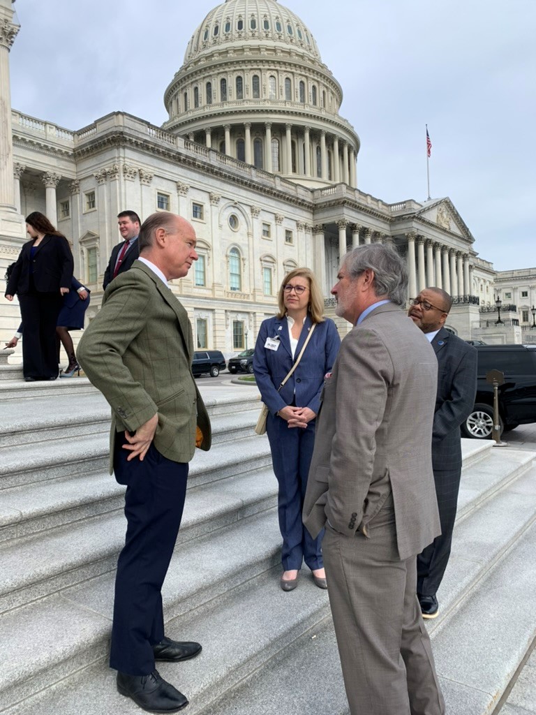 From left, Rep. Rep. Robert Aderholt speaks with Principal Karissa Lang, CLAS Executive Director Vic Wilson, and Director of Student Services of Florence City Schools Rod Sheppard. Photo by Dan Gursky.